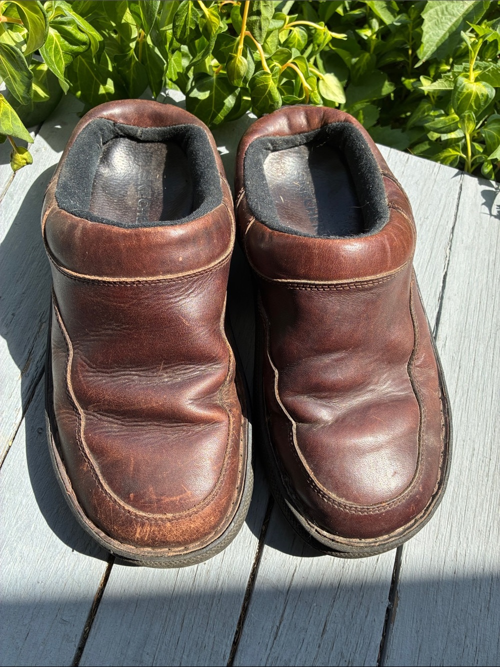 Sketchers brown leather slip-on clogs, size 10.